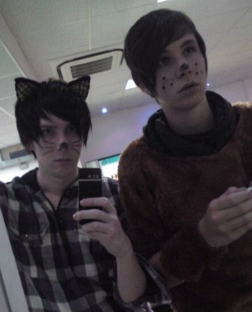 PRIDESDAN's tweet image. Me and gfs cat and bear costume from 4 years ago (our first time meeting irl) in honor of Phanoween week :-)