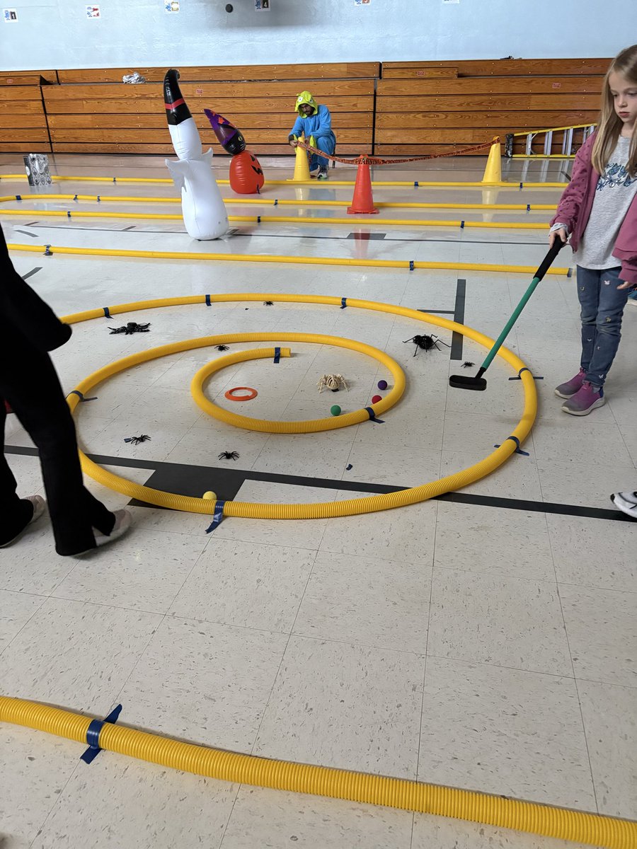 StillwaterK6's tweet photo. Outstanding job by our PE teachers for transforming our gym into a 12 hole mini golf course to celebrate Halloween week. #Halloween2025 https://t.co/vwcLTLWDQd