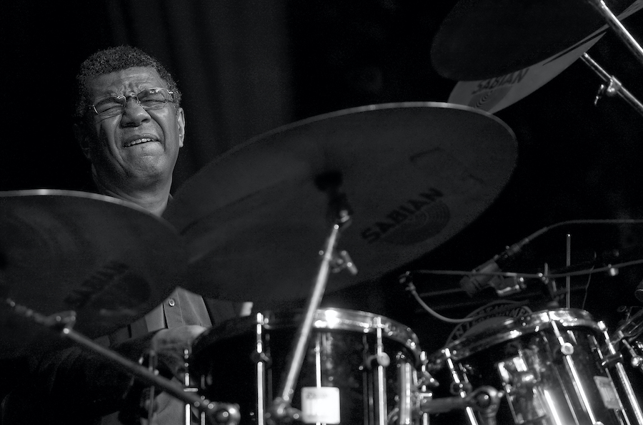 In Memoriam: Jack DeJohnette 1942-2025
Jack DeJohnette, a bold and resourceful drummer who forged a unique vocabulary on the kit over his 60-year career, died Oct. 26 at a hospital in Kingston, New York. He was 83.
tinyurl.com/2vzuvuax
Photo by Steven Sussman