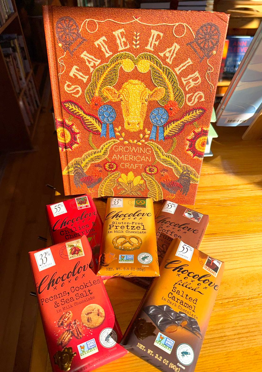 Happy Monday. It's an Orange kinda week at @piragisbookstore --- This is a wonderful book about the craftsmanship of seed art and State Fairs. It pairs well with a variety of treats covered in chocolate available @piragisoutfitting Retail Store. Used Gear On Sale Today!