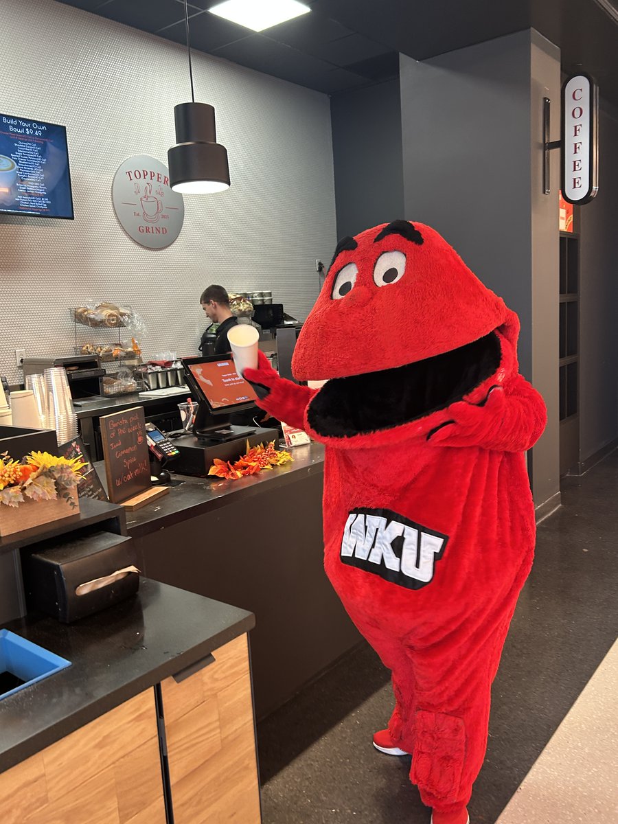 Homecoming Week = officially kicked off by Big Red! ❤️ Big Red couldn’t decide what to be today — front office greeter, Dean ,  future Hilltopper recruiter, or Finance professor 📊. But let’s be real… Big Red’s favorite stop was definitely Topper Grind ☕️
#wku  #wkuhomecoming