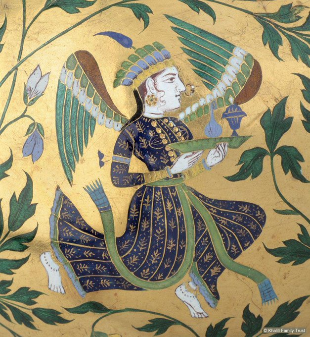 A stunning huqqa water pipe from 18th-century Mewar, India. Decorated with cloisonné and champlevé enamels, this huqqa water pipe features vibrant angels bearing gifts. A treasure of Indian enamelled artistry. | bit.ly/3GXpmaI