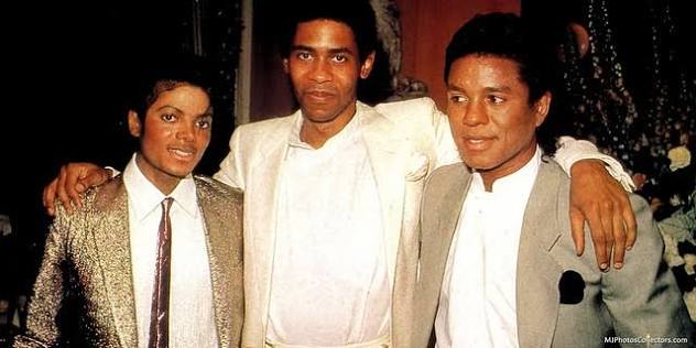 ??? 

Two white men? Who is the second? Cuz, this is John McClain, the co-executor with Branca, in between Michael and Jermaine.