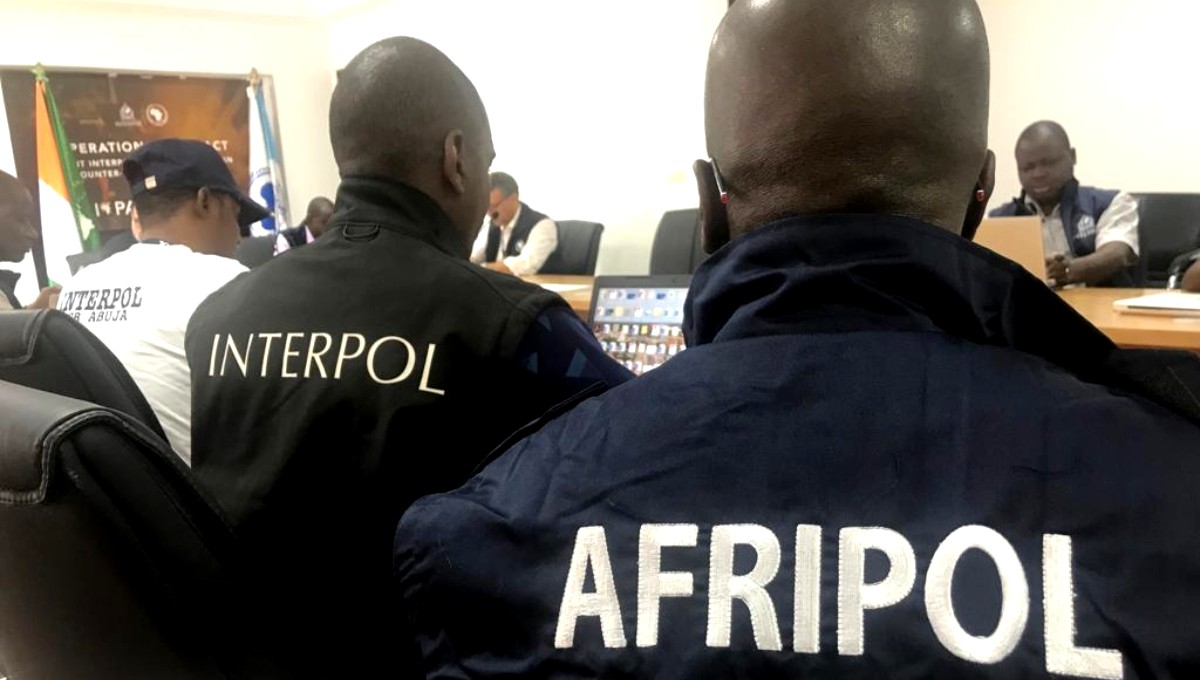 Binance compliance team working with Interpol officials during Operation Catalyst