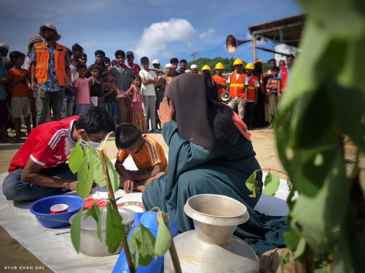 ayubkhan_dkl's tweet photo. During a Cultural Event: Raising Awareness on Cyclone EW-AA, in the Rohingya refugee camp, a father teaches his son, a mother prepares food and together they plant trees, hope of survival as the community gathers to learn and grow stronger.

#RohingyaRefugee
#CycloneAwareness https://t.co/CJP0fBwcig