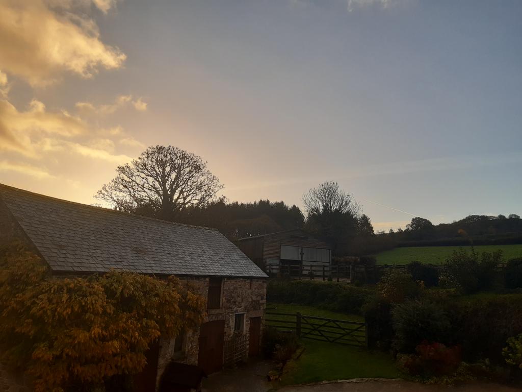 Just spent an hour in bed watching the colours change of the view from the bedroom. Good Morning 🌄  It is beautiful down in Devon