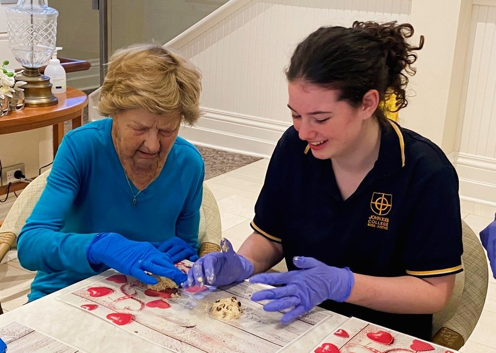 JTC_johnxxiii's tweet photo. Sweet moments &amp; sweeter stories! Our Year 9 students visited Aegis Montgomery House as part of their Roncalli Service learning; baking chocolate chip biscuits &amp; sharing stories across generations. #PeopleForOthers https://t.co/hBzYCrpufb