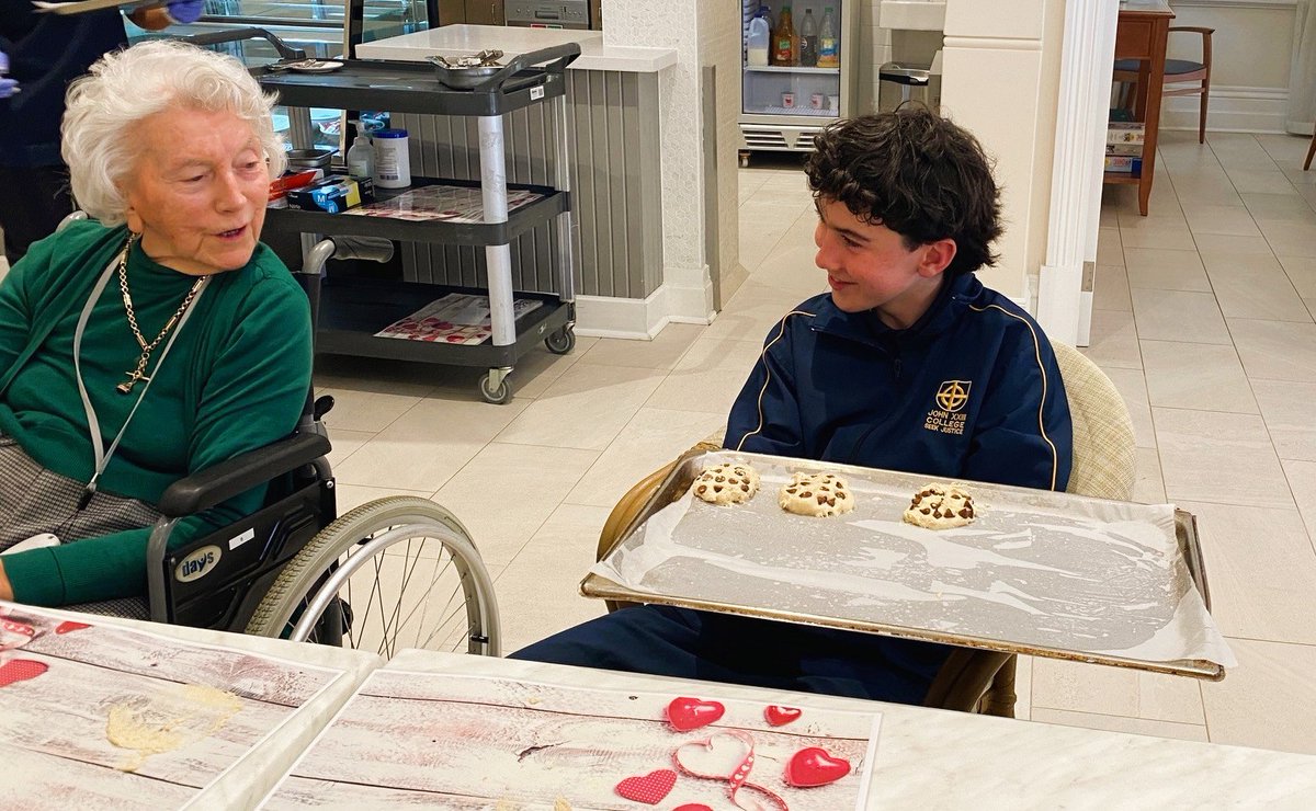 JTC_johnxxiii's tweet photo. Sweet moments &amp; sweeter stories! Our Year 9 students visited Aegis Montgomery House as part of their Roncalli Service learning; baking chocolate chip biscuits &amp; sharing stories across generations. #PeopleForOthers https://t.co/hBzYCrpufb