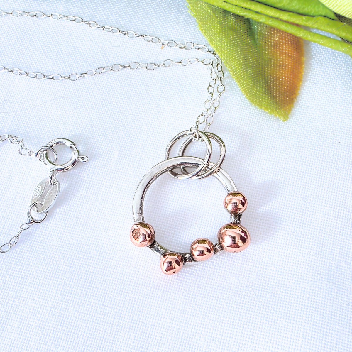 Exciting! I have this brand new circle necklace to share with you. Made from sterling silver wire and recycled copper and crafted into an ornate ring thebritishcrafthouse.co.uk/product/sterli… #mhhsbd #earlybiz #shopindie