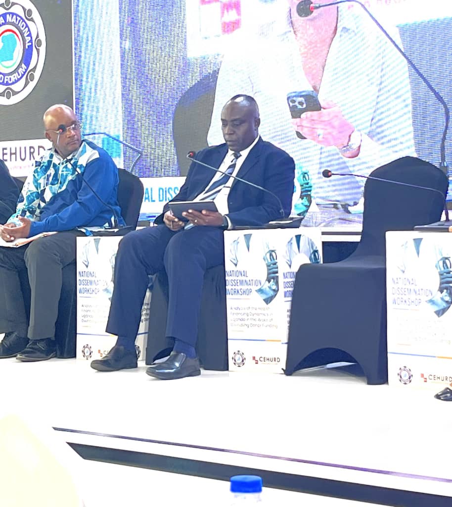 ElvisTrich's tweet photo. #HealthFinancingUG
Mr Patrick Mwanaja:
"Because of our development agenda, the government is committed to promoting human capital development, and you see it from the budget architecture.
We've seen human capital development getting the largest part of the budget, around 11.4 trillion, moving on to 10 trillion last financial year, showing a growth of 9.6%.But turning to the health sub-program, the figures have already been shared by Fahad and Richard.
We've seen growth since 2021 from 2.1 to 5.5, contributing 8% of the budget, and then a new growth of about 9.6%. So government is committed to increasing financing, and our focus, as has already been mentioned, has been on creating infrastructure at the health centers, district hospitals, rural referral hospitals, and so on.
But challenges remain, and they have been highlighted, including operationalizing these facilities, through equipping, through staffing, and so on"