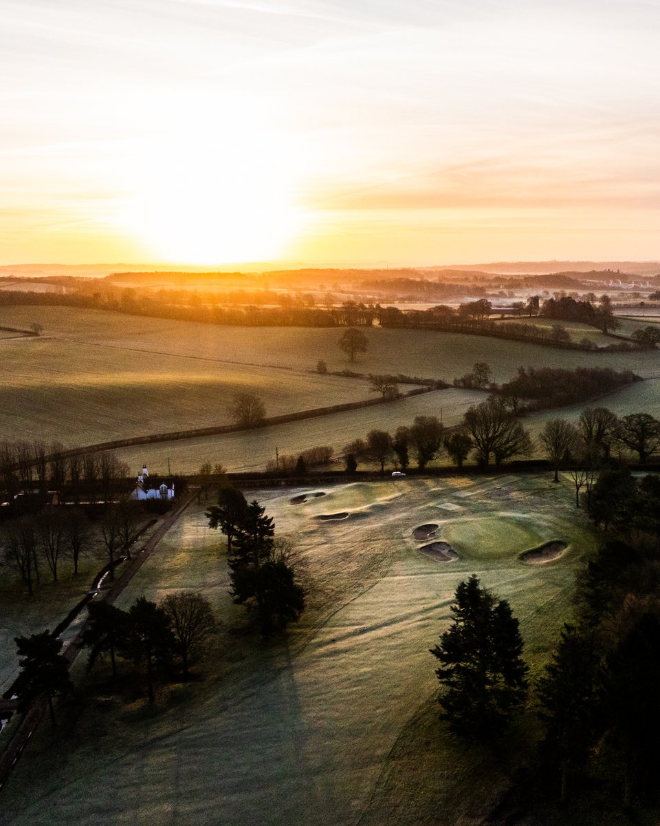 Sunrise over the 3rd and 14th greens – two very different tests perched on the same ridge. Both demand uphill approaches, but from opposite ends of the bag.