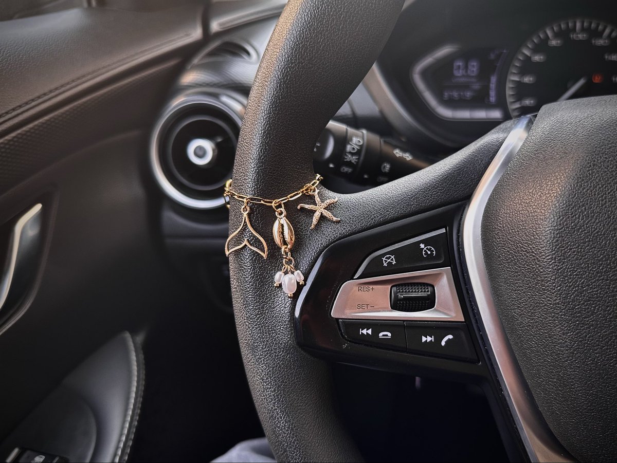 RozieThinks's tweet image. I made a steering wheel charm…