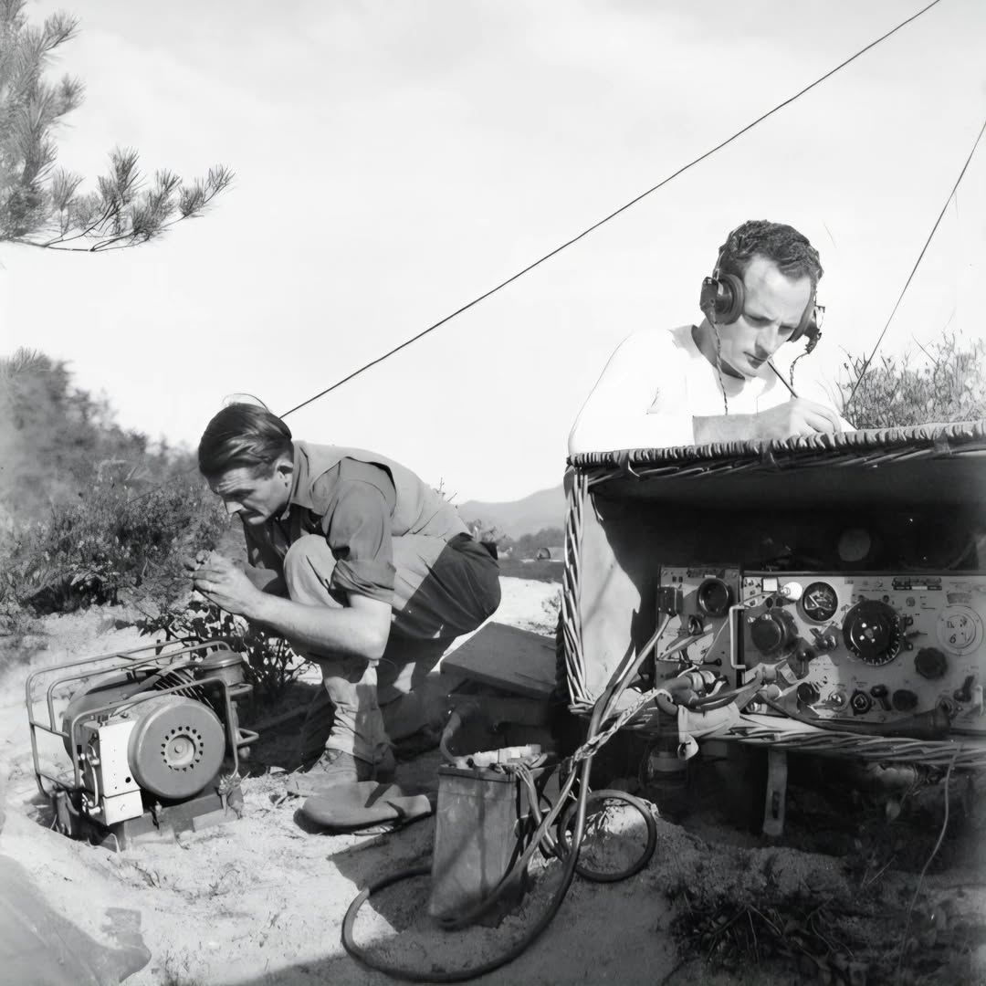 Two signalmen from the 3rd Battalion, Royal Australian Regiment (3RAR), are seen operating a field wireless set during amphibious training on remote islands in the Inland Sea of Japan. October 1949