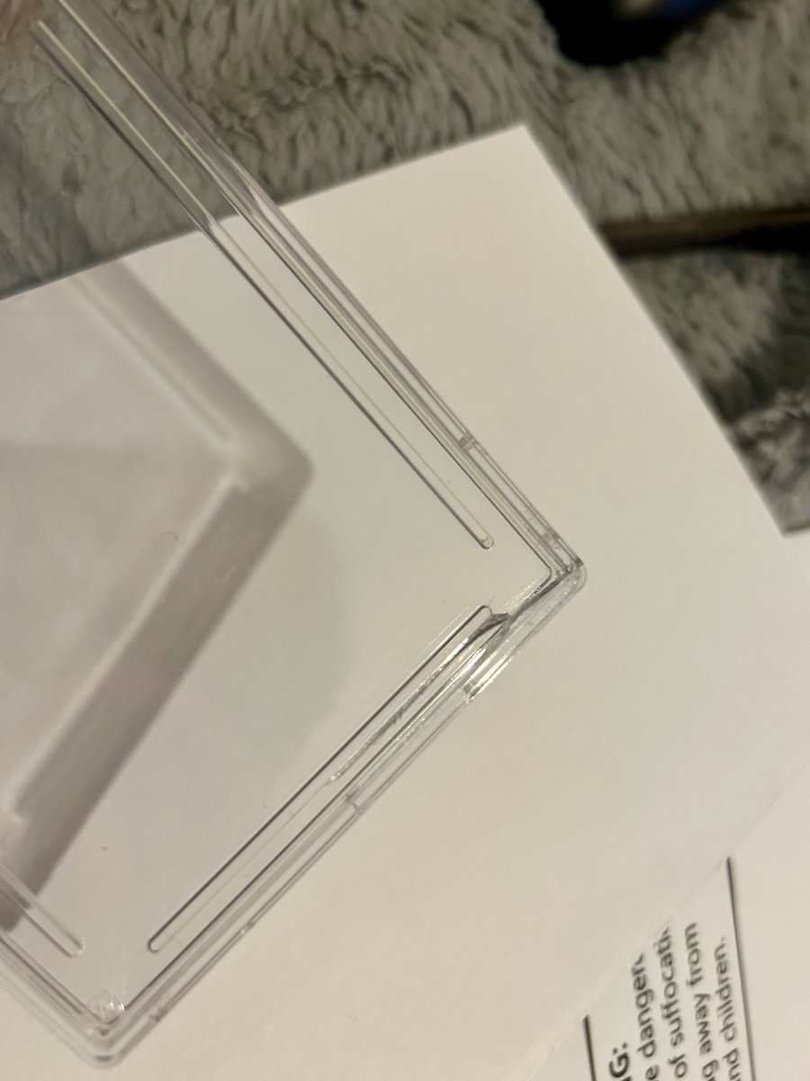 I won’t lie. This was scarily easy. Put a bit of pressure on each corner with a bottle opener one at a time. Then just twisted the slab with my hands and was able to release the back plate. Only one small crack in the case. I wasn’t being gentle with it either. 🤔