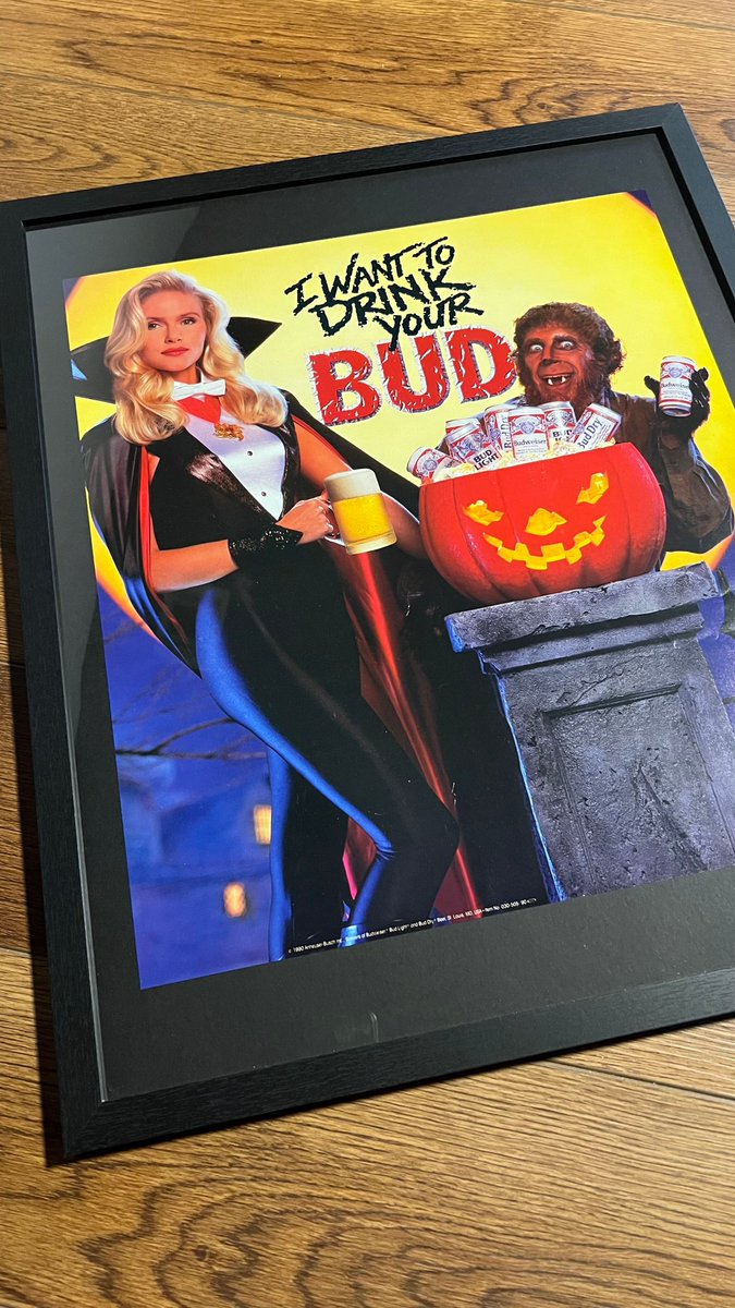 Finally got around to framing this 1990 "I Want to Drink Your Bud" poster. It's really gonna class up our home office.