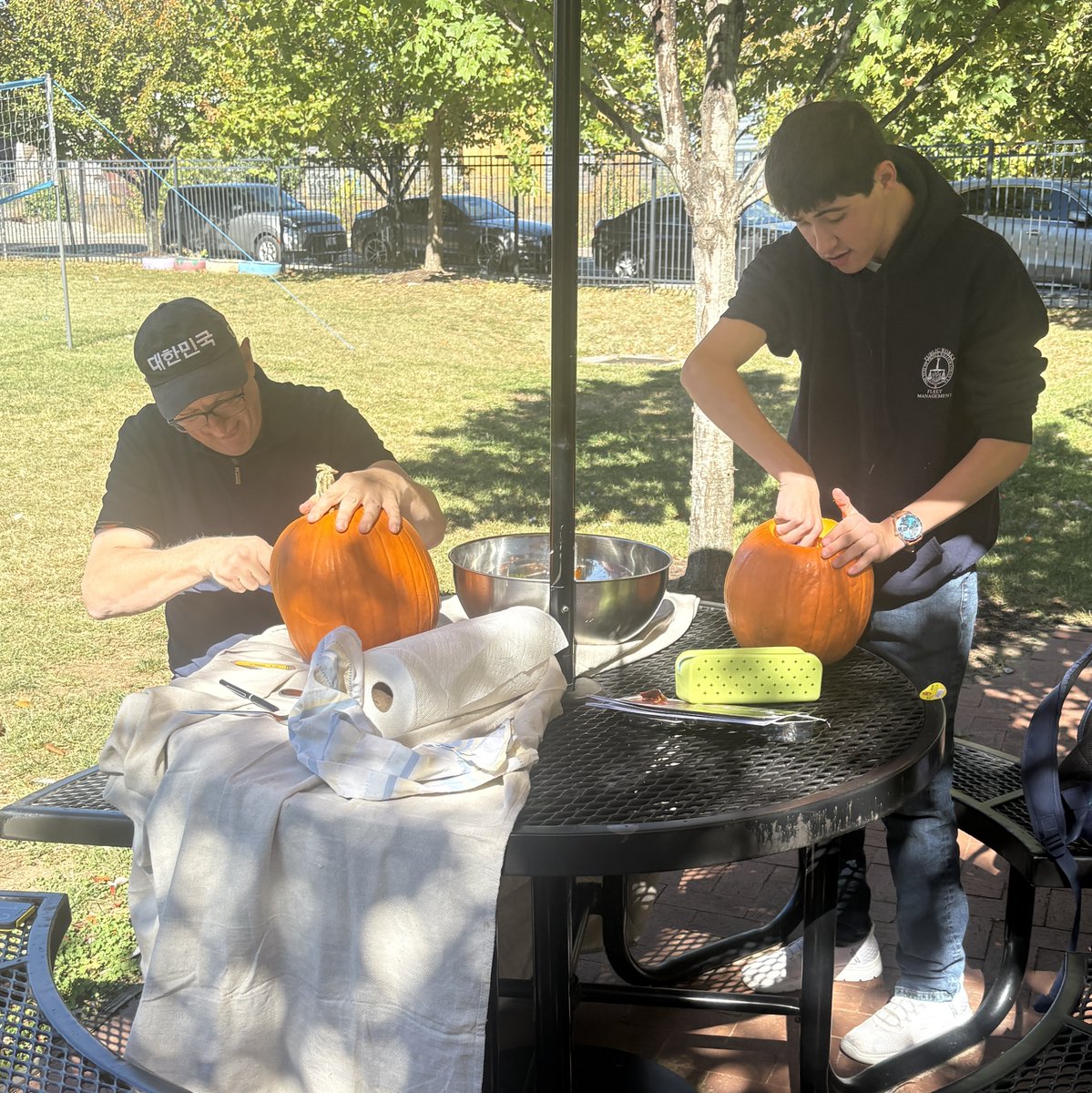CommunityHS's tweet image. For Brian&apos;s activity week, he took to carving pumpkins. Brandon joined him but took his home to finish. Great job, guys! 🎃