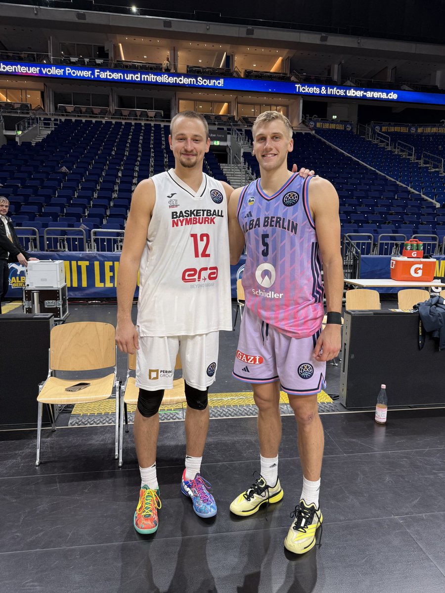 EastHighBball's tweet photo. Spartan alumni (Wes Dreamer &amp; Sam Griesel) after they battled each other on the court in the European Champions League in Berlin, Germany today!  #SpartansInThePros https://t.co/TA4PLyXiaO