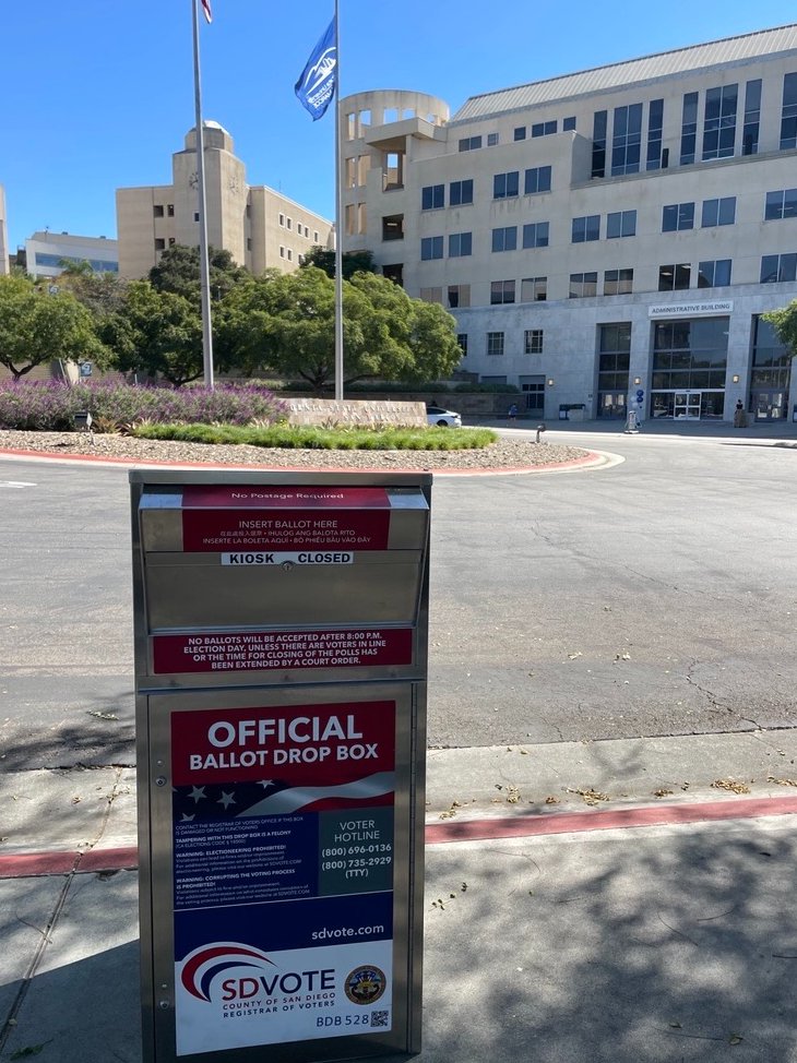 csusm_library's tweet image. A new permanent ballot drop box has been installed on campus. 🗳️ 
📍 Location: Near the U.S. Mailbox at the Administration/Kellogg Circle off Craven Road.
🗓️ Vote: Drop off your completed ballot (sealed in its return envelope) by 8 p.m. on Nov. 4!
#CSUSM🇺🇸