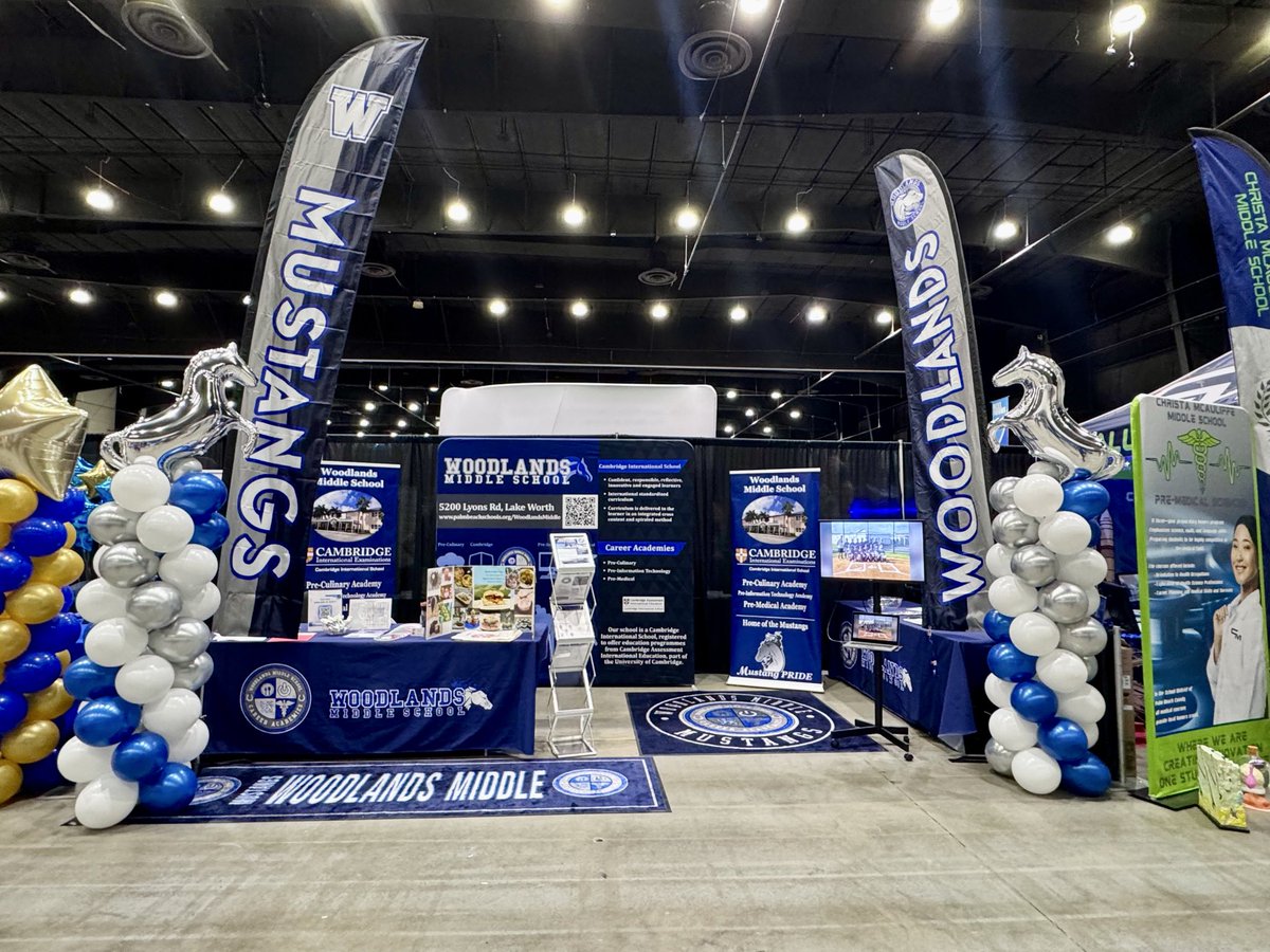 The Mustangs are setting the bar high with their booth this year! 🔥 You cannot miss those feather flags!! 🐎 Thanks <a href="/WoodlandsMS/">Woodlands Middle School</a> for trusting us with your campus branding and school showcase needs 💙