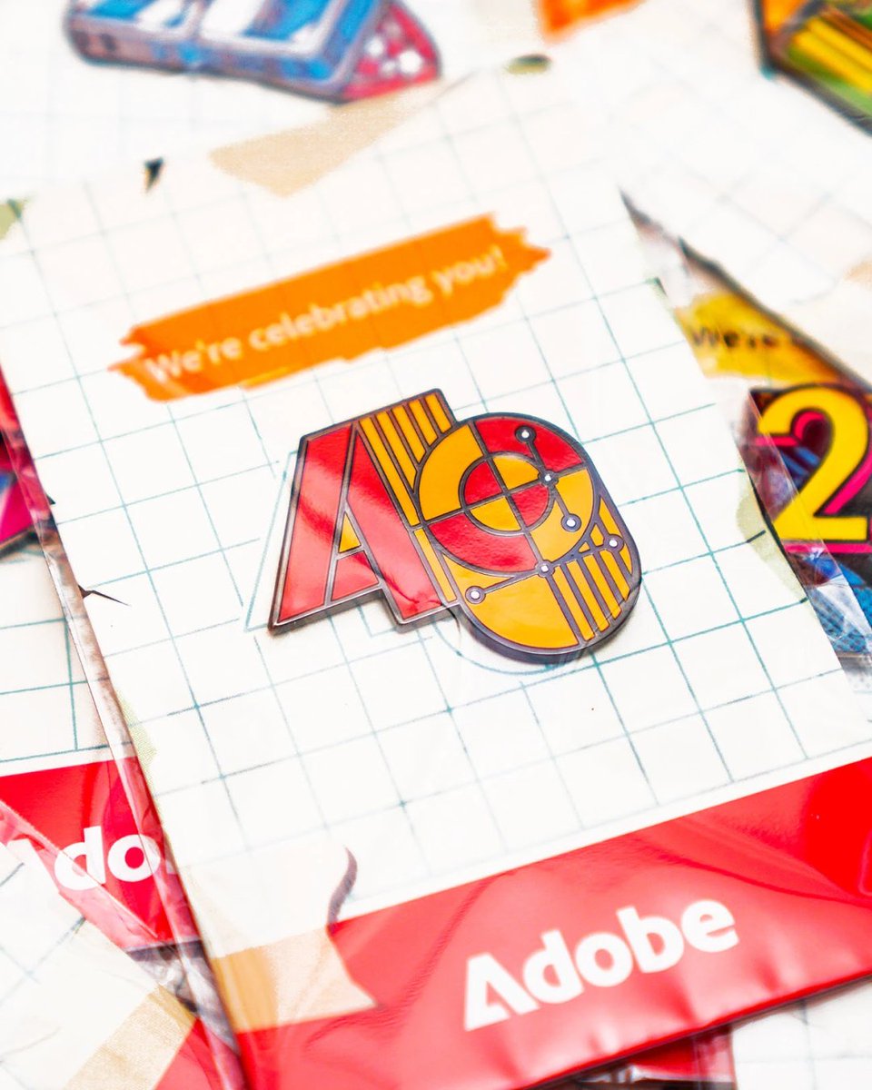 Behance's tweet image. .@thecreativepain designed these anniversary pins for #AdobeMAX. Each pin celebrates a different era in design.
