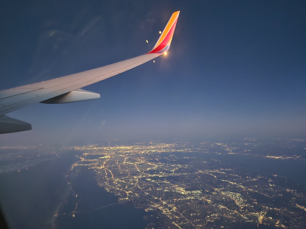 Transiting Long Island, an early AM flight just before dawn, looking towards Manhattan in the distance.