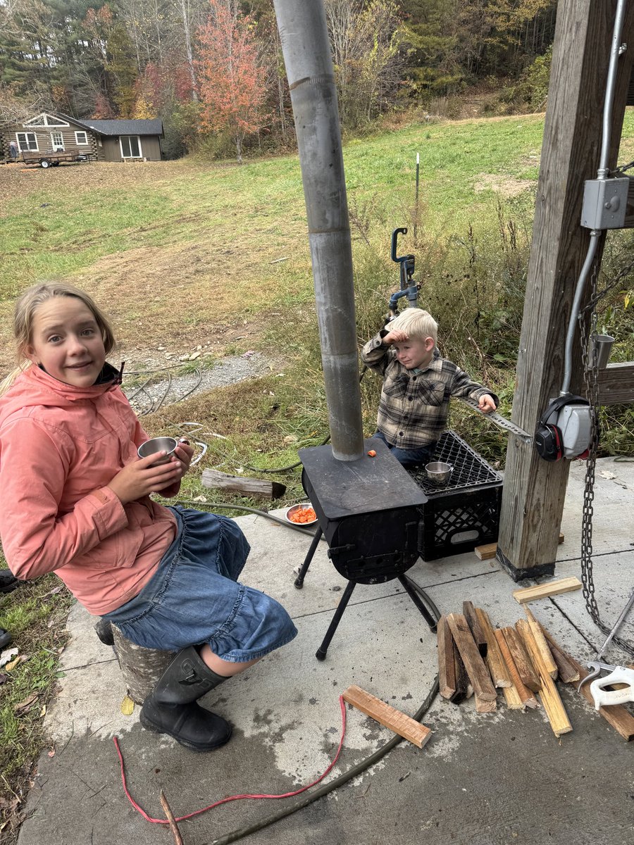 ItsJustinRhodes's tweet image. This is how you get kids used to butchering… just have them around it, even if it’s a tea party around a mobile wood stove (right next to the butchering) Then before you know it they’ll be leading the charge.