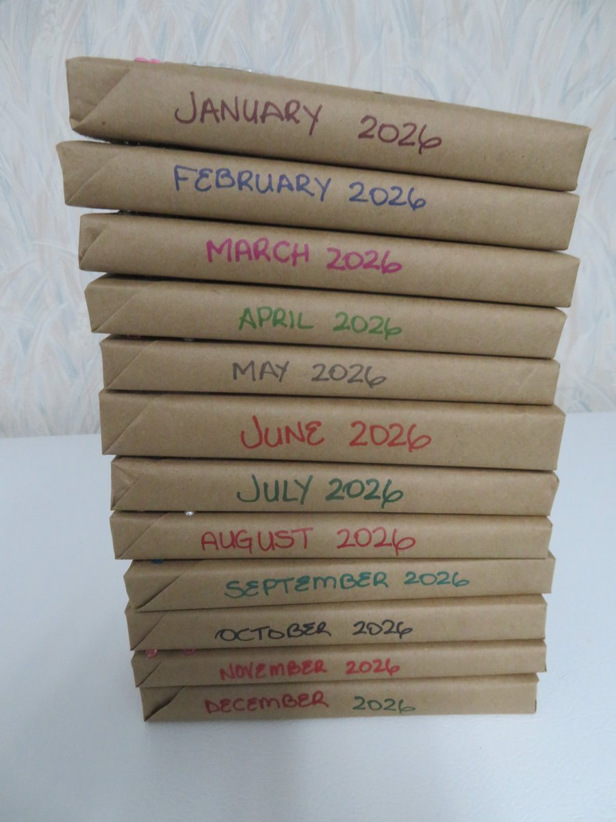 Since I am alone for Christmas (no family), I decided to choose and wrap 12 books from my growing TBR pile to put under my tree. This way I will have a "surprise" Blind Date With A Book to unwrap each month next year.  Wrapping the books was not as easy as it looks on Instagram.