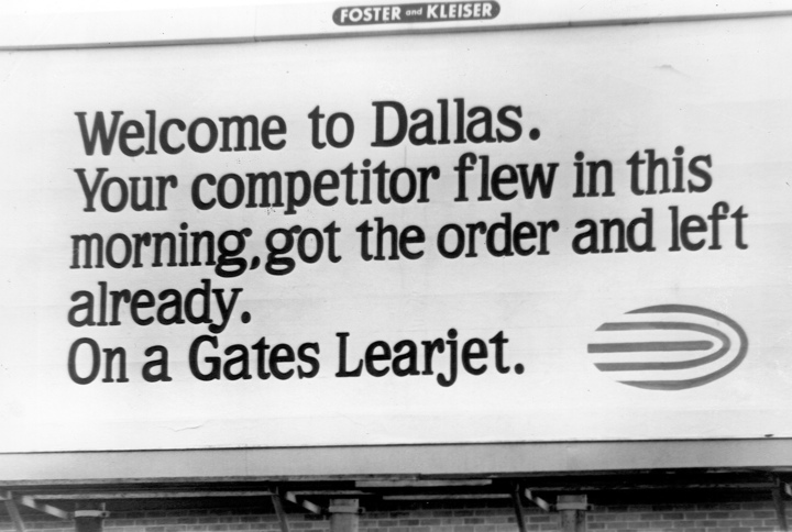 AIN_SkyWriter's tweet image. Periodic reminder as to why people use business aircraft (1980s billboard near exit from DFW Airport) #bizav #bizjet #avgeek