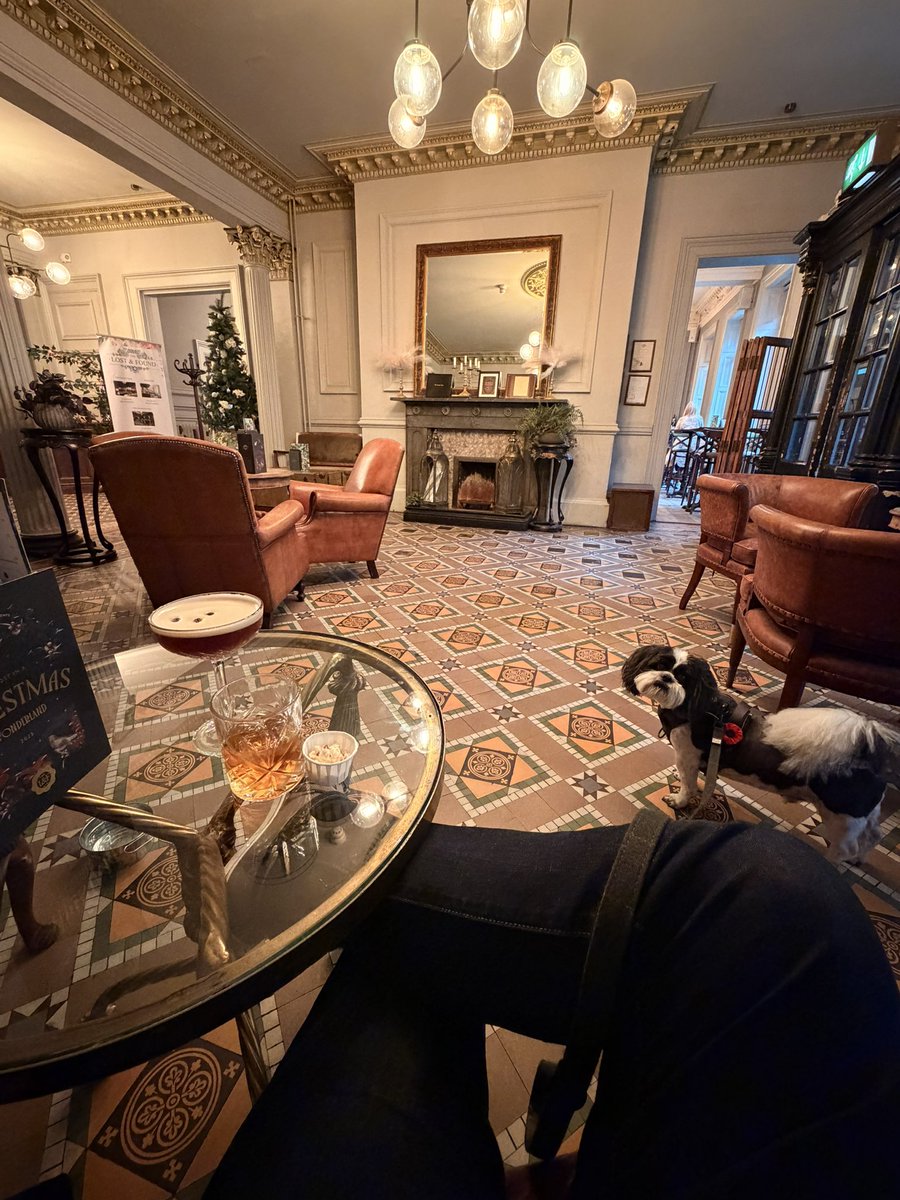 Enjoying a day off work the way it should be enjoyed. Peaceful cocktails with my pooch. 🥰