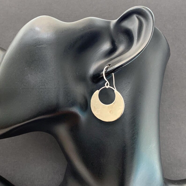 EarringsOfGem's tweet photo. Handmade hammered crescent hoop earrings with sterling silver hooks – artisan-crafted in German silver for a unique bohemian look.

Purchase via Etsy: https://t.co/dAKEqLPESa

#traditionallymade #handcrafted #handcut #hammered #polished #germansilver #sterlingsilver https://t.co/YmfIFdZHwE