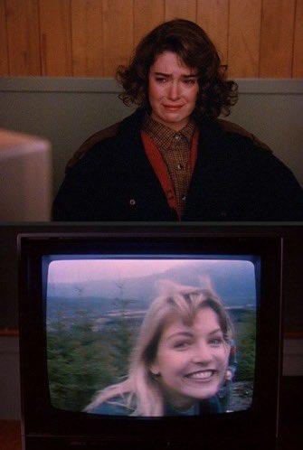 Ievylicious's tweet image. Both looking at a framed version of the other 💔