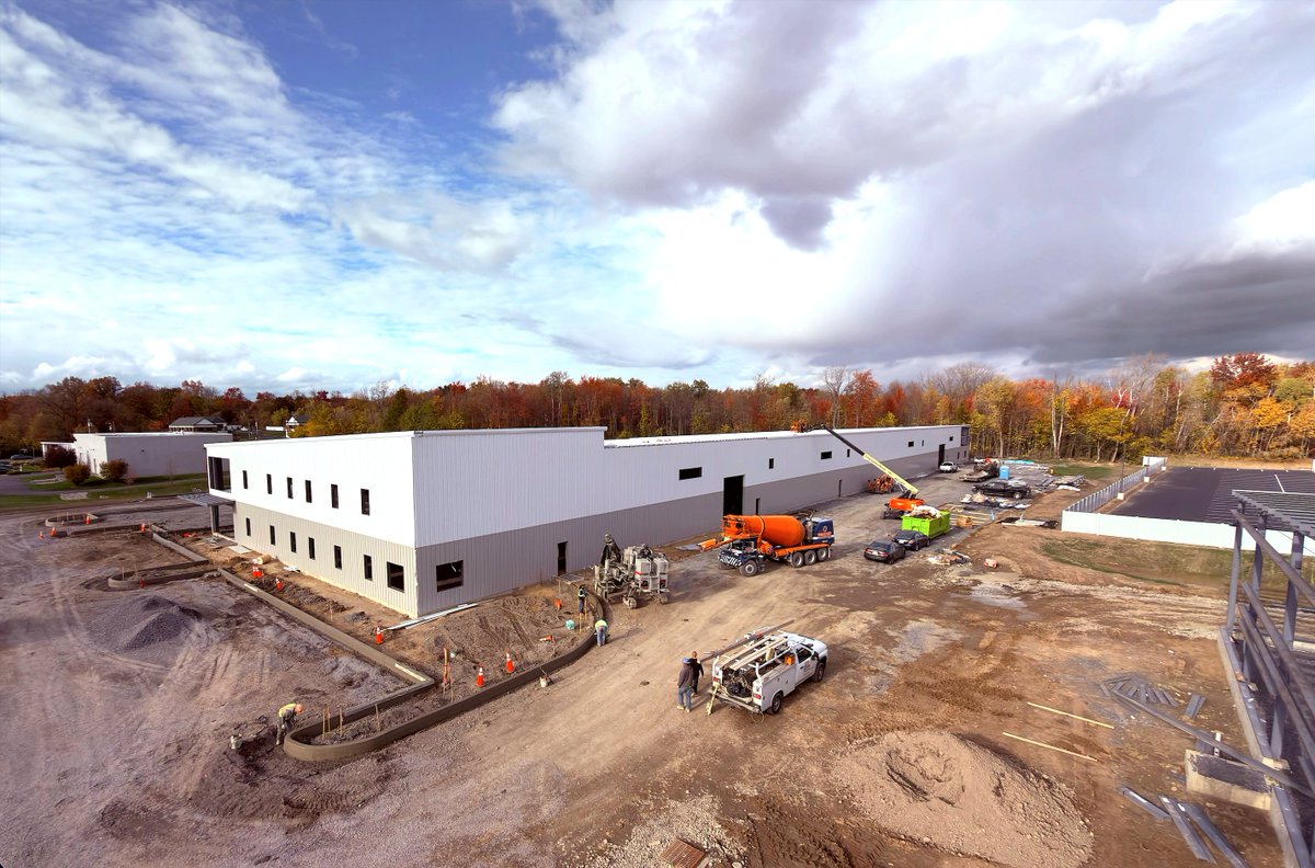 New campus Building 1 getting the parking lot framed out.