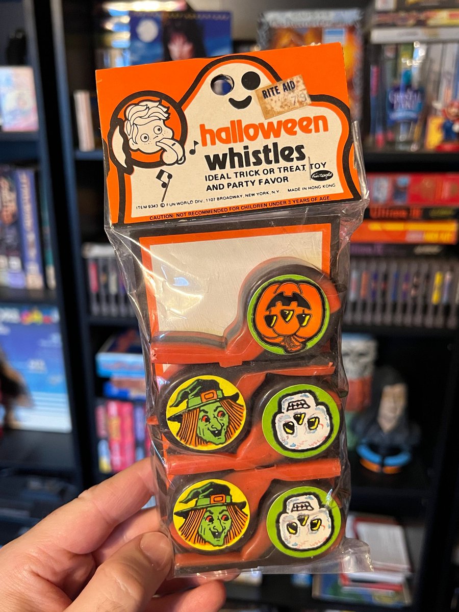 A pack of vintage Halloween whistle party favors. I don't know exactly when these are from, but I do know that they cost 79¢ at Rite Aid back in the day.