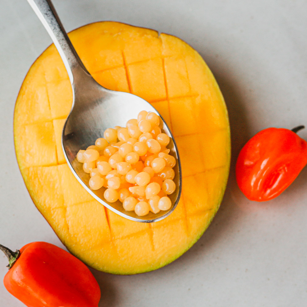spherificator's tweet image. Sweet, juicy, and tropical to the core. These mango pearls are sunshine in every bite 🥭🌞 #MangoMagic #MangoPearls #Spherificator #TheSpherificator #Spherification #MolecularGastronomy #NextLevelFruit #TropicalFlavors #FlavorPop #CreativeGarnish #FoodieInspo #GourmetTouch