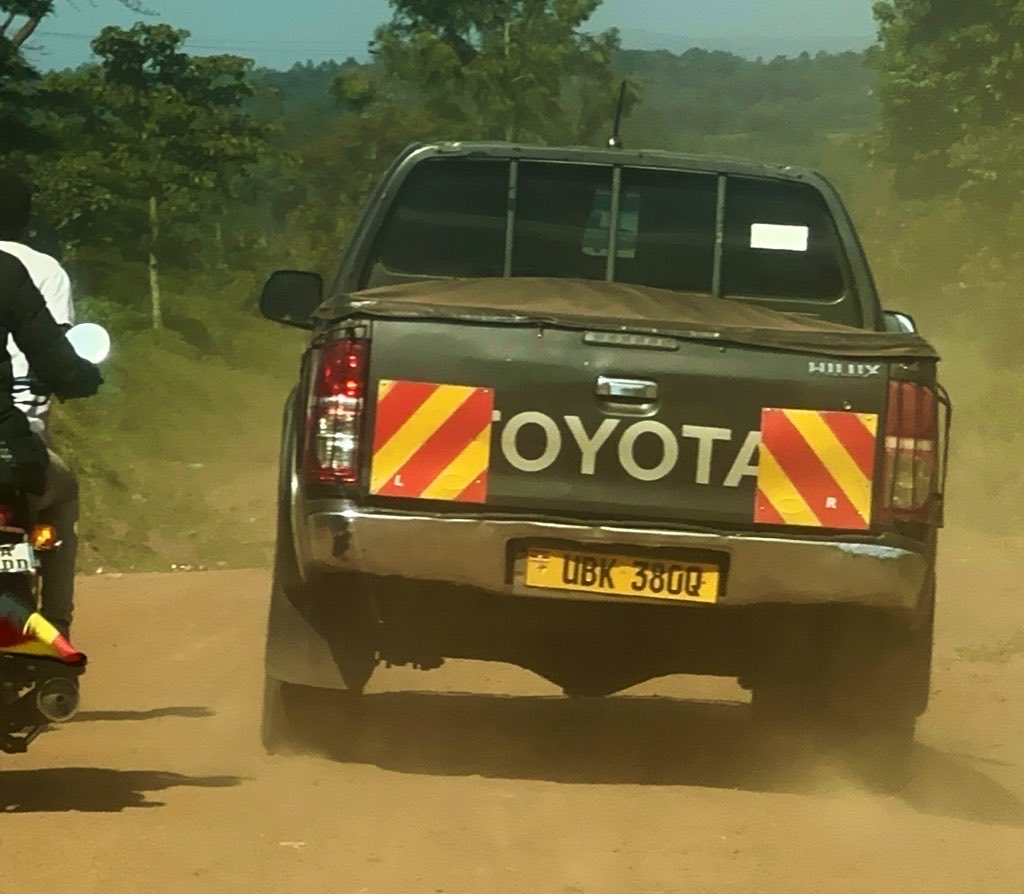 From the cut-out engravings on its side mirrors, windscreen, URA clearance and insurance, its actual registration plate is UAX 078Q. 

This car was cleared by the tax authority under the contacts: 256775388773 belonging to Bonifance Mulendhe of email; bonneymulendhe01@gmail.com