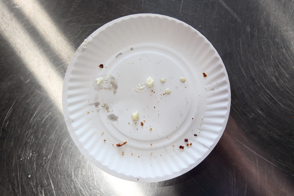 In chilly weather, a warm blanket — of cheese — on a mortadella-stracchiatella square at Luigi's Pizza, Ozone Park, Queens