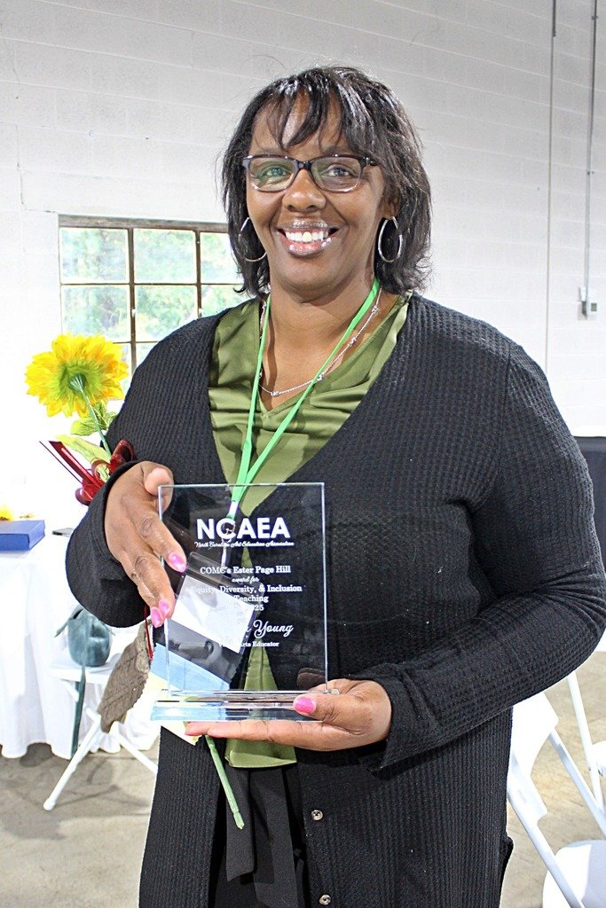 Congratulations Mrs. Young!  Mrs. Young is this year's recipient of the COMC's Ester Page Hill Award for Equity, Diversity, and Inclusion in Teaching from the North Carolina Art Educator's Association.