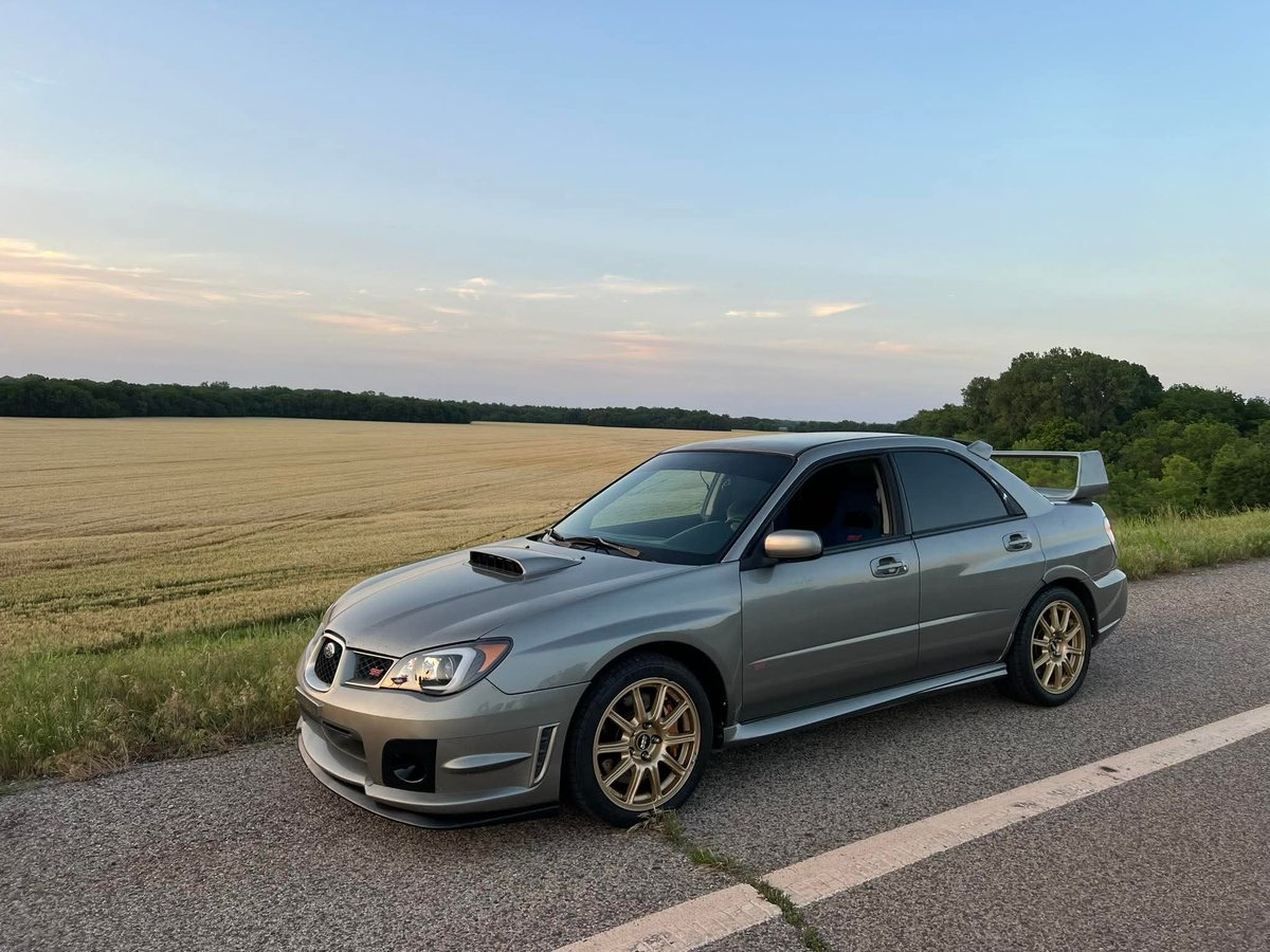 Subaru Impreza WRX STI with 217,892 miles (350,663 km) on the clock.

Original engine, transmission, and clutch. 
It leaks a little bit of oil but it still runs well.