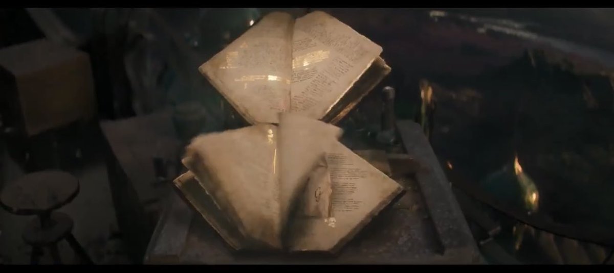 s2mu5l's tweet image. right so the grimmerie is gonna be opening for glinda at the end of the movie FOR SURE, look at this new clip shown of the book opening it has to be the same clip of glinda atop the emerald city remembering elphabas dg moment