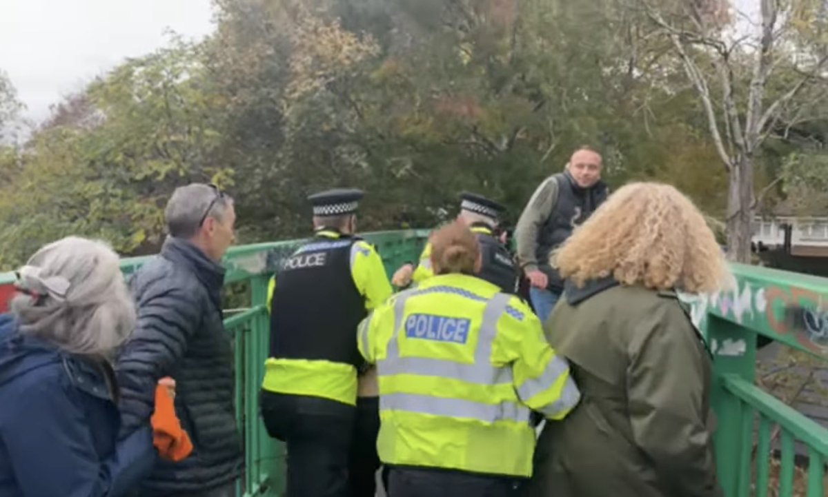 Police caution and release man for throwing a bottle at Anti-asylum hotel protestors from St Denys footbridge in Southampton on Sunday.