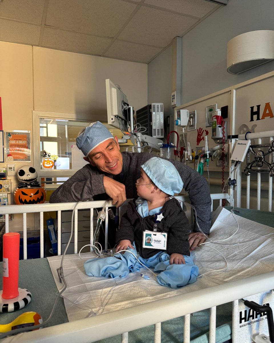 radychildrens's tweet photo. Dr. Nigro &amp; his mini-me, baby Z! 👯💙

This Halloween, Zachariah dressed up as his favorite heart surgeon – Dr. John Nigro, Division Chief of Cardiac Surgery &amp; Cardiac Transplant Services, with the most heartwarming costume. 👨‍⚕️🩺🎃 https://t.co/cZ1hNne4Ef
