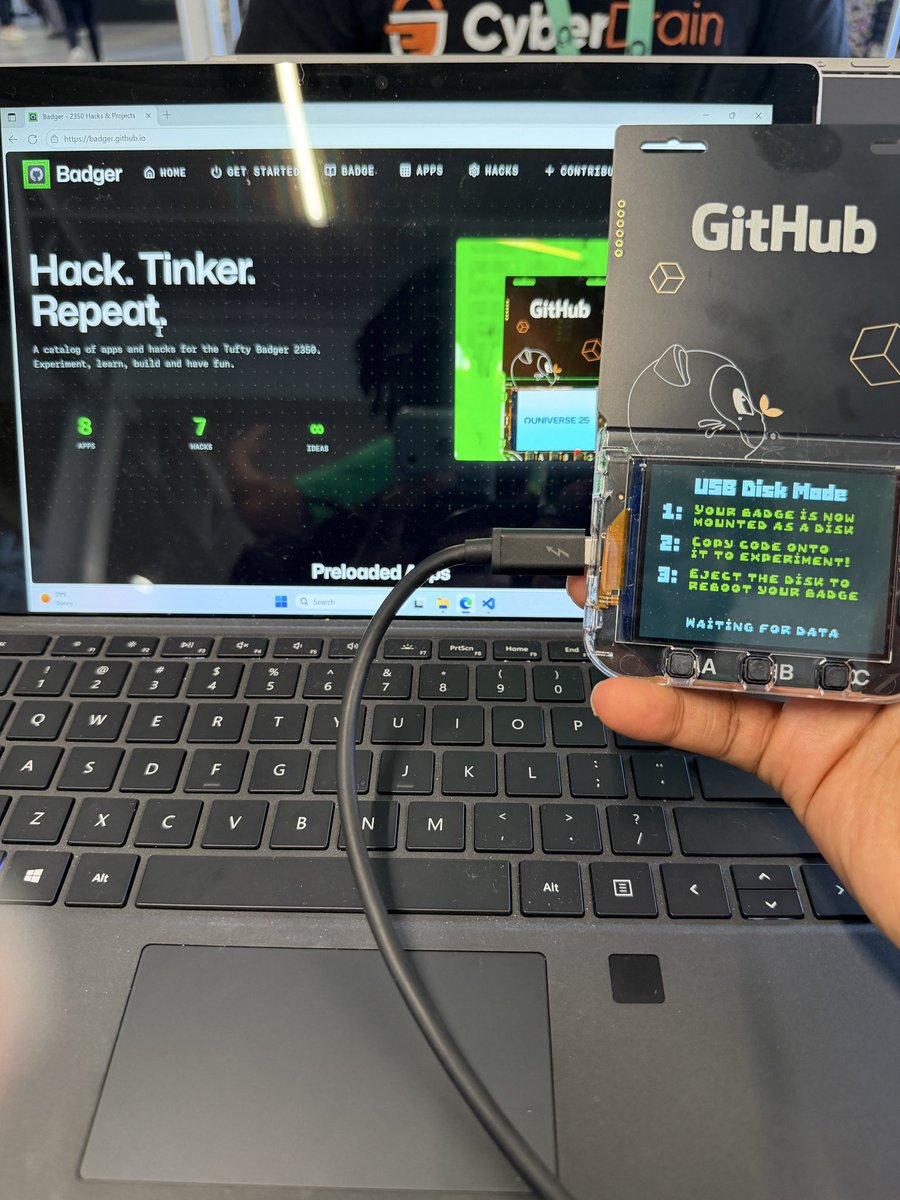Ace_KYD's tweet image. Just hacked my badge and added the snake game to it #GitHubUniverse 🔥