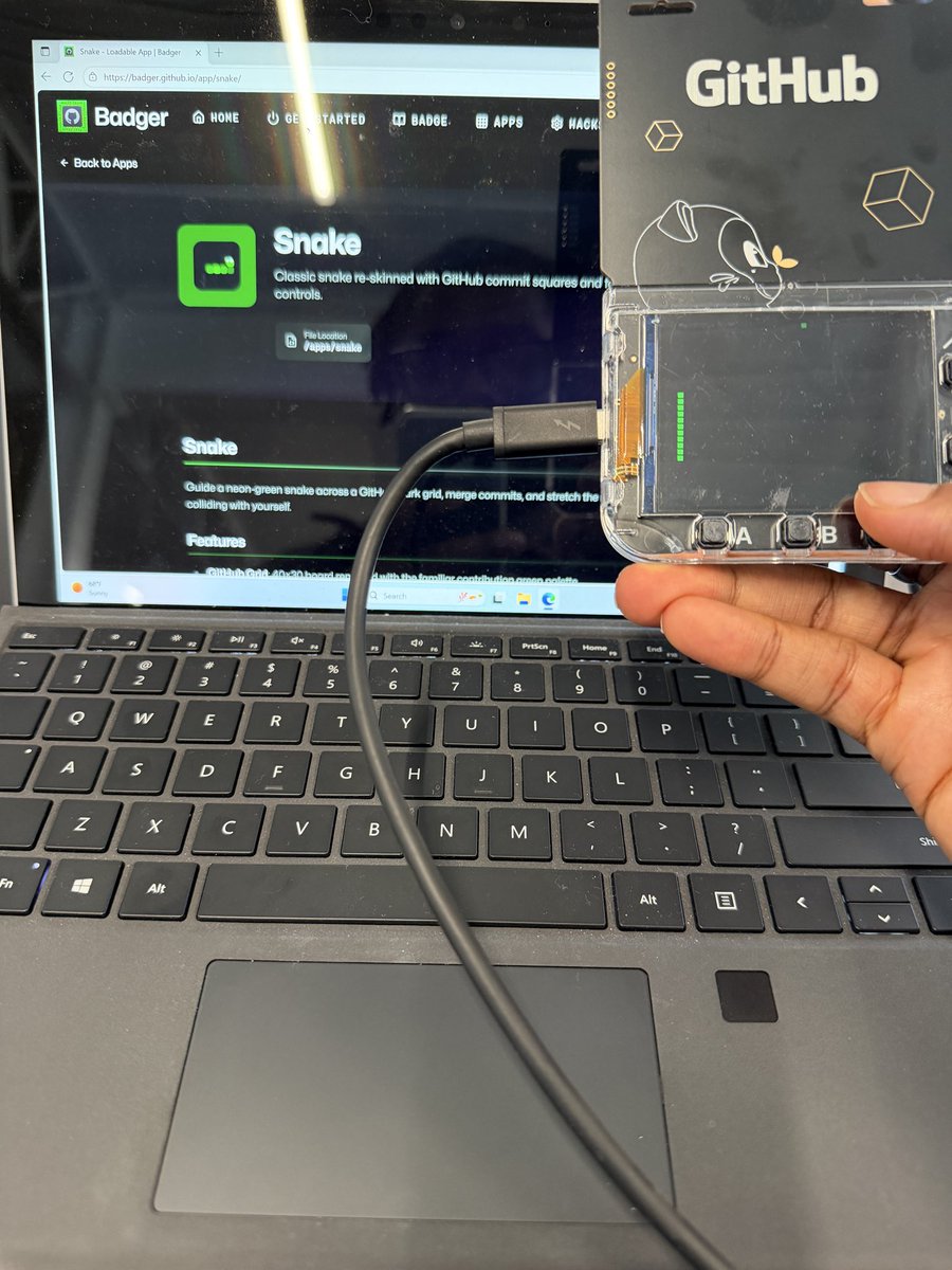 Ace_KYD's tweet image. Just hacked my badge and added the snake game to it #GitHubUniverse 🔥