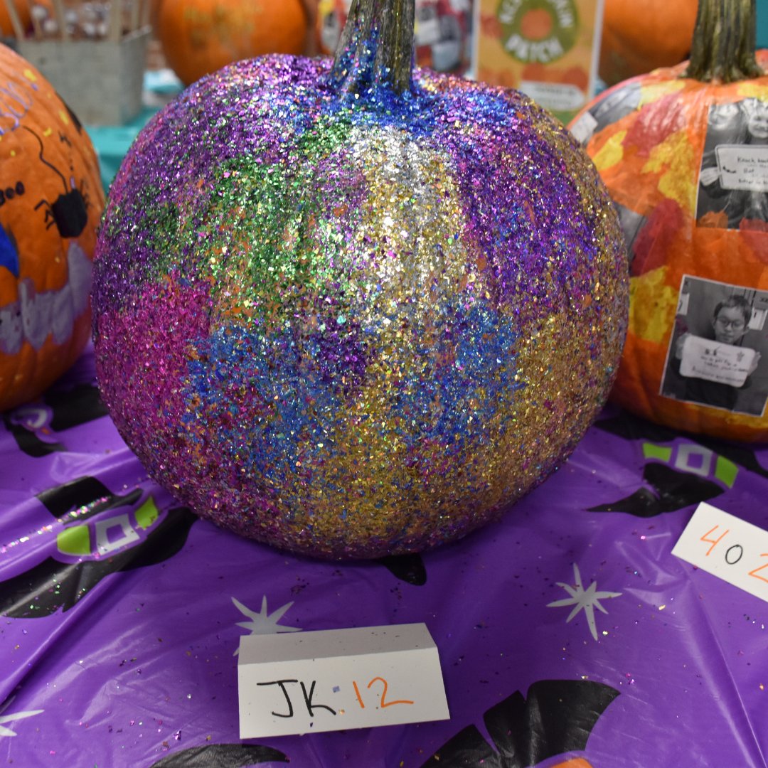 Our lobby has been transformed into the cutest pumpkin patch in the city! 
...and VOILÀ! Look at what our creative students turned them into! Each class got to decorate their own, and the results are fa-boo-lous. Be sure to stop by the lobby to see our very own KCS pumpkin patch!
