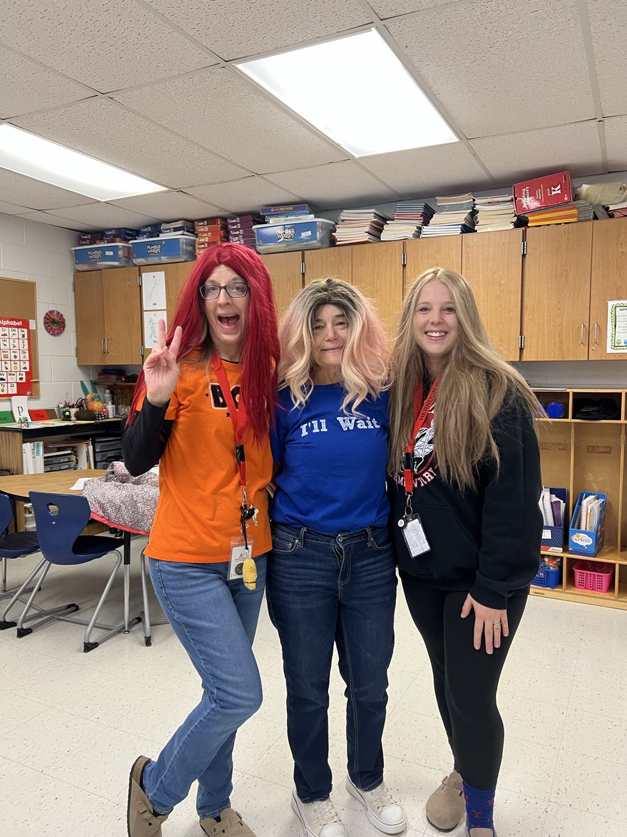 AteachingBear's tweet photo. We turned "crazy sock day" into "crazy socks and wigs Wednesday" 🤣 it was such a great way to start the day hearing the laughs from our co-workers as we walked the halls! @Herndon_ES https://t.co/qEQgCzMwrf