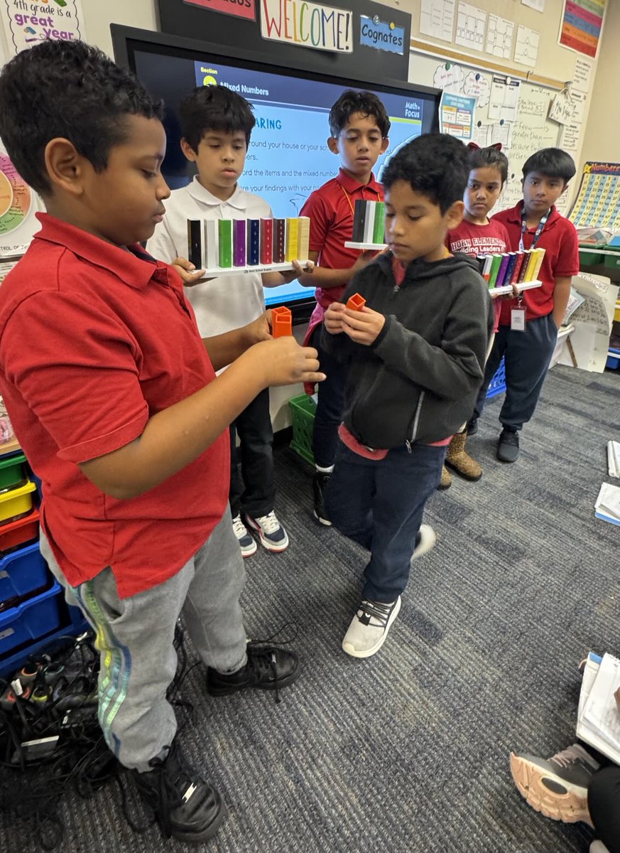 vega7myriam's tweet image. Building fractions with Fraction Stax! #fractions #mixednumbers #improperfractions #Math @AliefISD