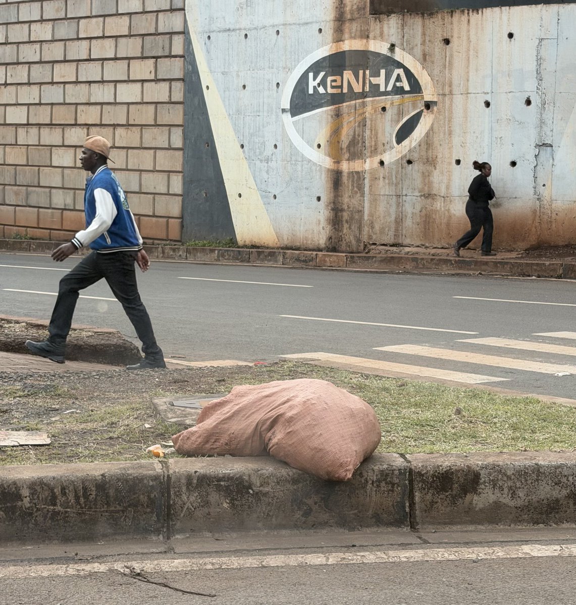 ahmadsalims's tweet photo. Today it hit me. So bad. So deep.

How far we’ve let Nairobi sink.

Driving to the office this morning I pass through Westlands, that illegal stage is still there. The same one I was once told pays a million shillings to certain “officials” just to be left alone. And now it’s chaos. Matatus blocking every road. No regard for anyone. No care that people are late.
No shame that they’re the reason traffic isn’t moving. You talk to them they look at you and say, “Fanya vile unataka.”

Drive a bit further, reach the Expressway roundabout, that underpass that was closed, there’s now a full kibandaski setup there. People frying mandazis. Benches, tables, people eating.
We’re literally two metres away from the smoke.

Then there’s a boda guy… just standing there peeing… literally stepping on puddle of pee. 

This is our Nairobi now. We are fucked. We fucked Nairobi. 

Our governor is busy asking people to take photos of garbage like that’s a solution. County officers have dropped their tools the only thing they’re good at is harassing people. You raise a voice, they send someone to check your license.
They even warn you “Usisumbue mkubwa.”

Honestly, I can’t wait for the day Nairobi wakes up and chooses right. Because this is not it.

If it means the national government takes it back like they did with NMS, so be it. At this point, I’d fully support it.

Nairobi is sinking. And we’re just watching.