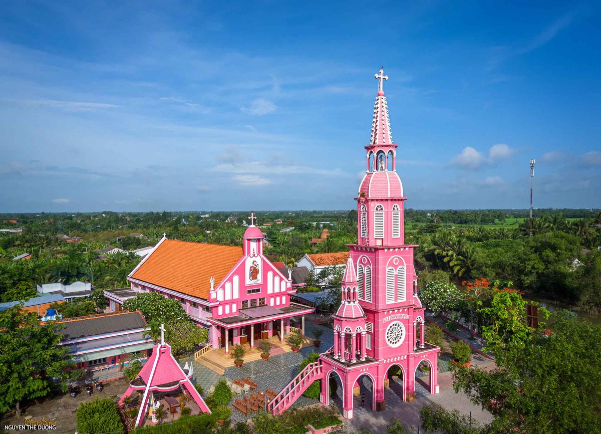 NoiTour56002's tweet photo. Standing out with its pink paint in the middle of a river garden landscape, Nhon Phu Church is a religious structure bearing the unique historical and architectural imprint of the Southern Delta region.
Photo: Nguyen The Duong
#nhonphuchurch https://t.co/0wvBJPCJAL