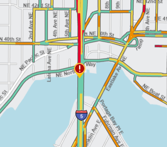 wsdot_traffic's tweet photo. SB I-5 at Ship Canal Bridge, a rollover collision is blocking all but the right lane.

Those traveling to or through downtown Seattle from the north should plan for extended delays. https://t.co/qwWXU1Gz2i