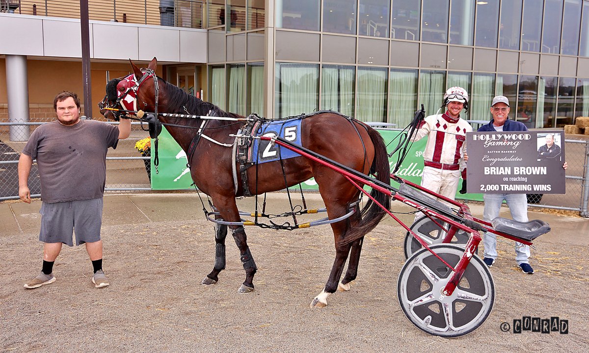 Congratulations to trainer Brian Brown, who won for the 2,000th time in his training career on today's card <a href="/HollywoodDayton/">Hollywood Dayton</a>. Son in-law Cam McCown drove Groove to the milestone triumph and accepted the sign on his behalf. (photo by Conrad Photo)